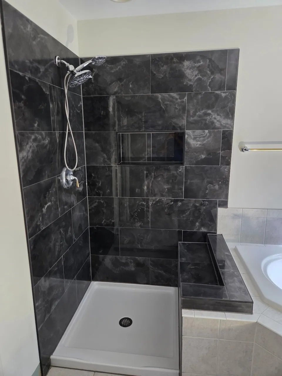 Luxurious bathroom with modern fixtures and elegant tile work