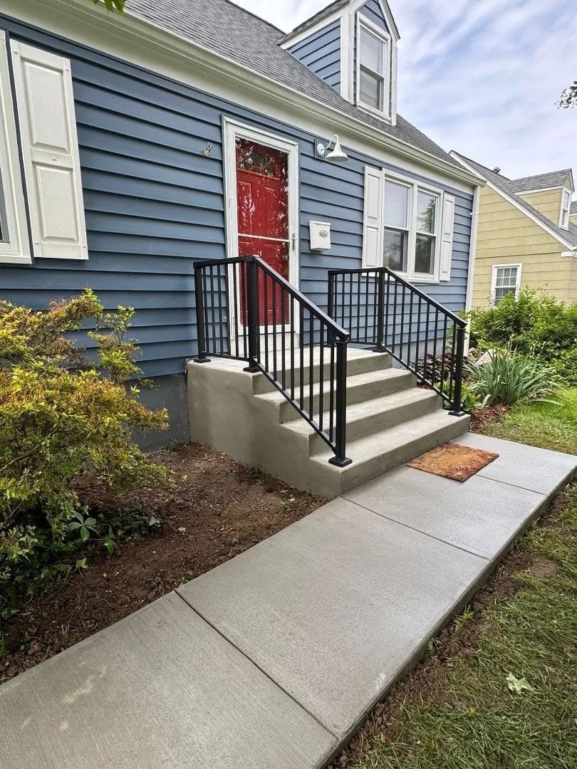 Concrete sidewalk with concrete steps