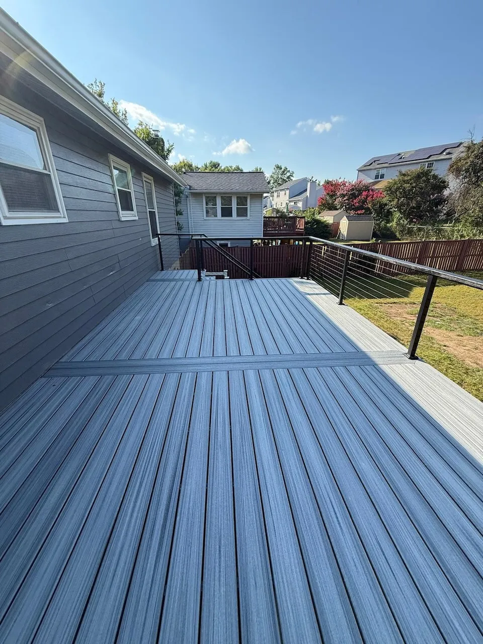 Composive deck with built-in seating and planters